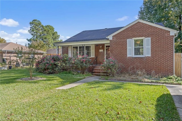 view of front of property with a front lawn