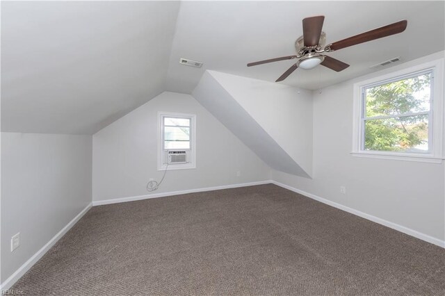 bonus room featuring ceiling fan, lofted ceiling, and carpet