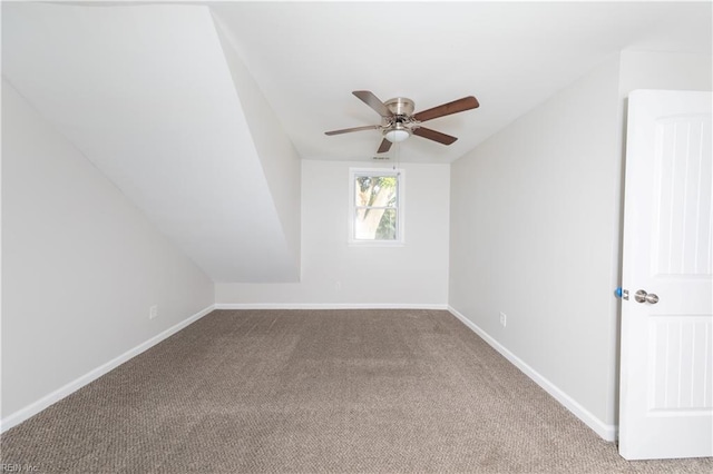 bonus room featuring carpet flooring, ceiling fan, and vaulted ceiling