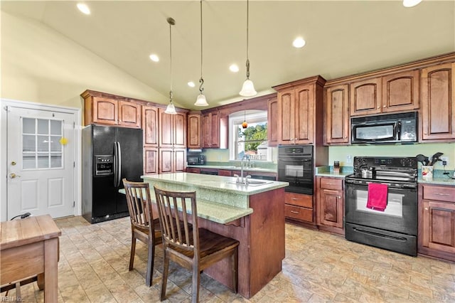 kitchen featuring pendant lighting, sink, black appliances, and lofted ceiling