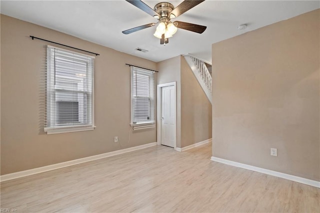 interior space featuring light hardwood / wood-style floors and ceiling fan