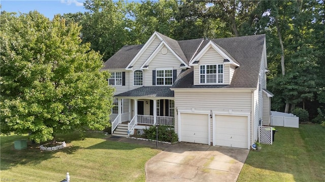 view of front of property featuring a garage and a front yard