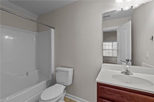 full bathroom with vanity, washtub / shower combination, and toilet