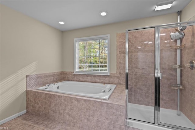 bathroom featuring independent shower and bath and tile patterned floors