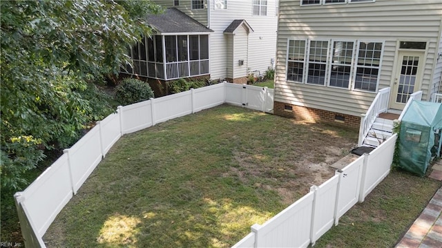 view of yard featuring a sunroom