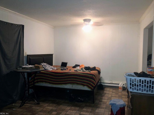 bedroom featuring ornamental molding and baseboard heating