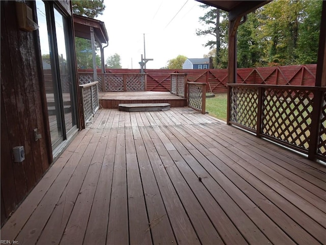 deck featuring a hot tub