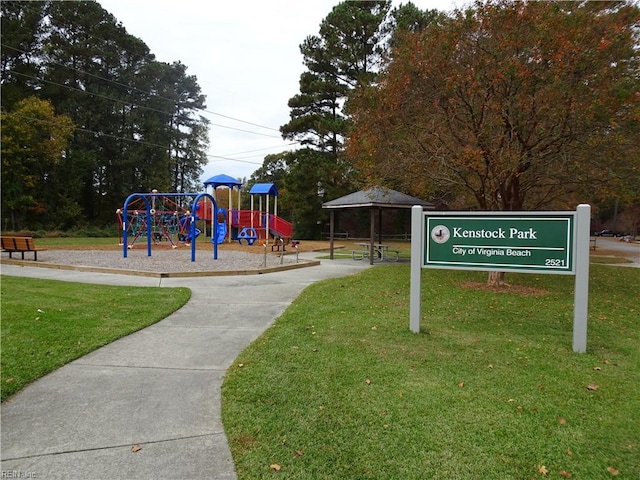 view of playground with a yard