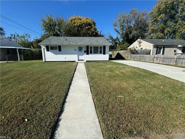 view of front facade featuring a front yard