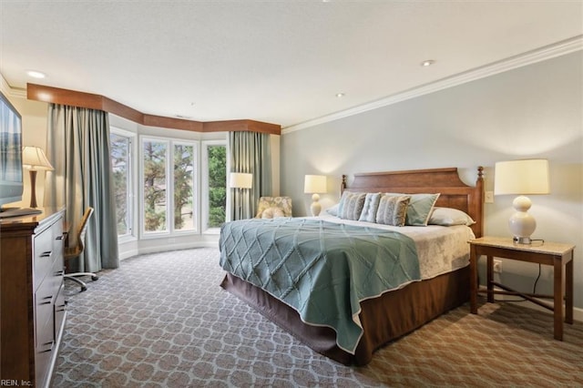 bedroom with carpet flooring and crown molding