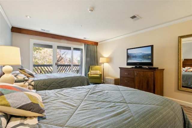 bedroom featuring hardwood / wood-style floors, ornamental molding, and access to outside