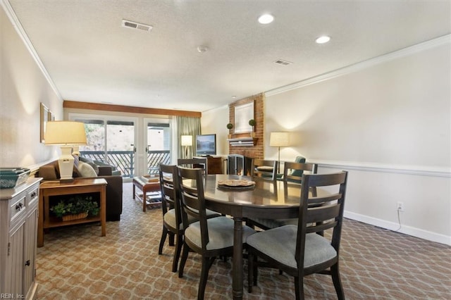 dining space with crown molding