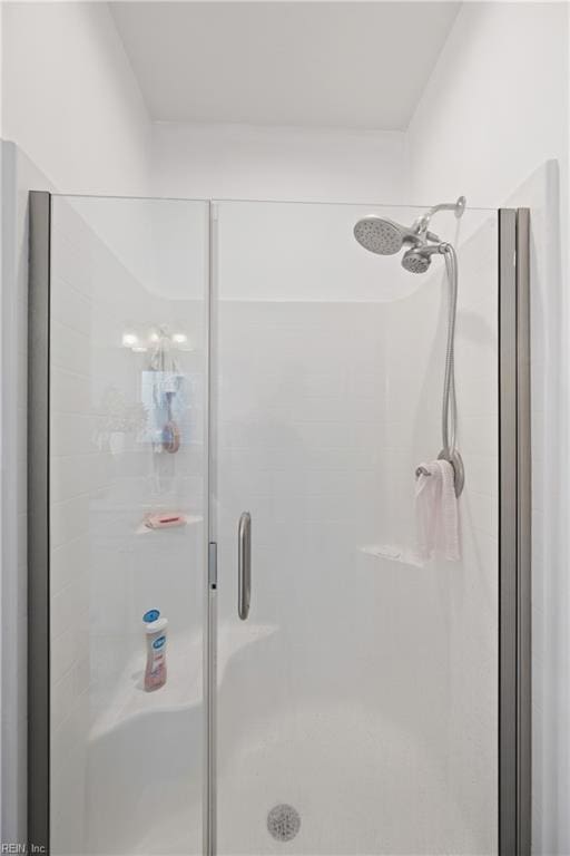 bathroom with an enclosed shower