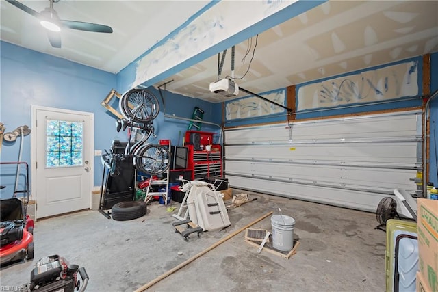 garage with ceiling fan and a garage door opener