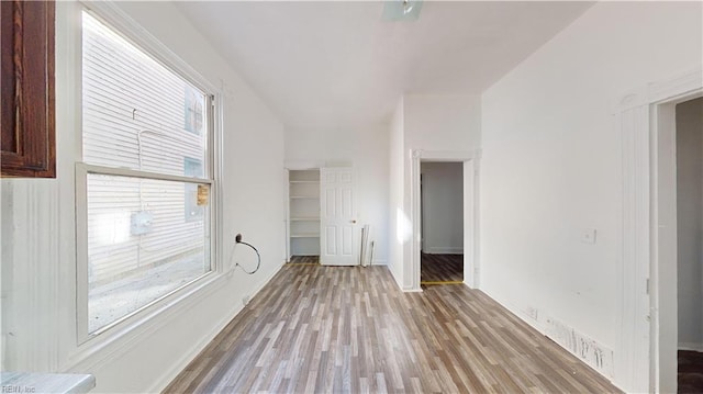 unfurnished living room with light hardwood / wood-style floors