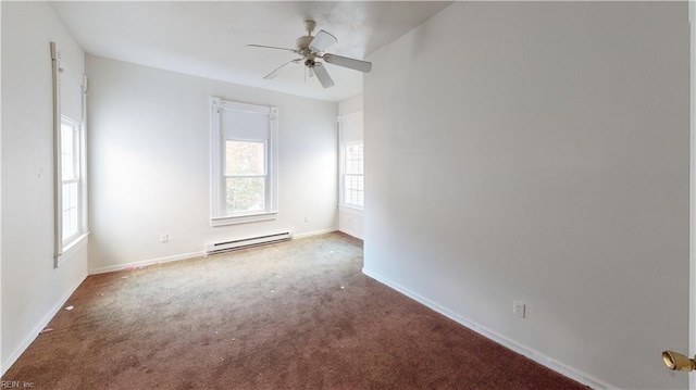 empty room with carpet flooring, a baseboard radiator, and ceiling fan