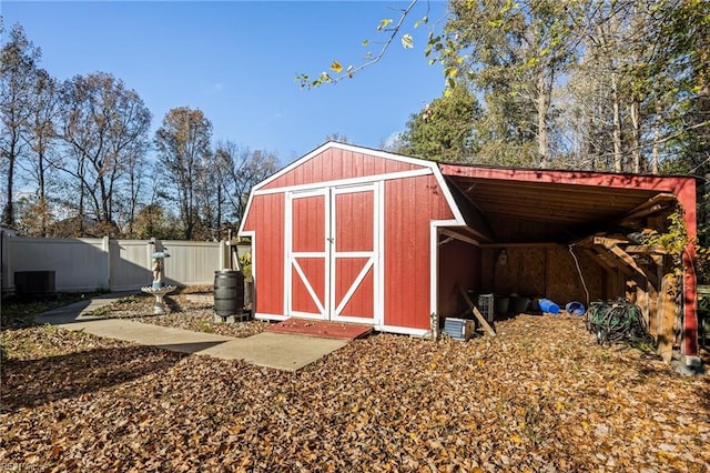 view of outdoor structure with a carport