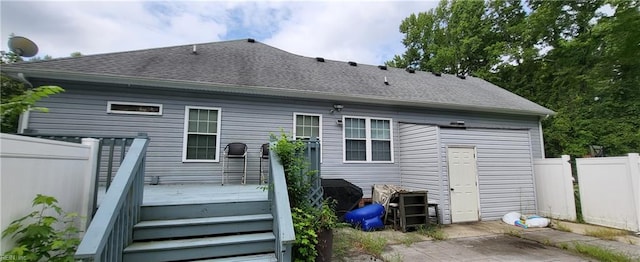 rear view of house with a deck