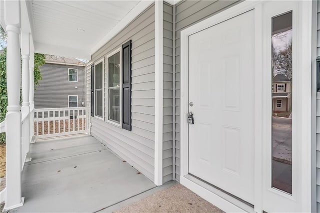 property entrance with a porch