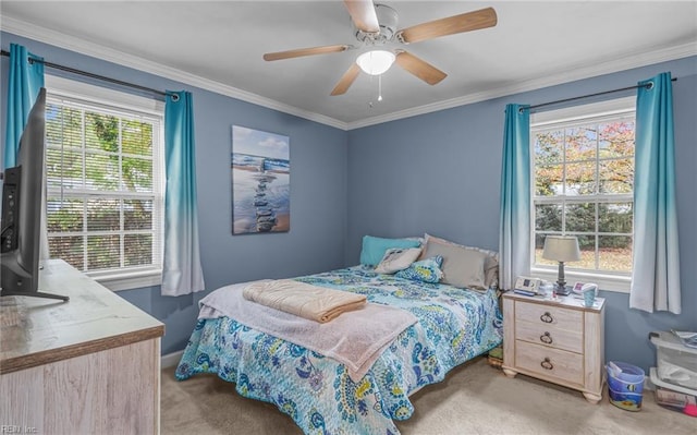 bedroom with ceiling fan, multiple windows, crown molding, and light colored carpet