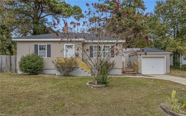 view of front facade with a garage and a front yard