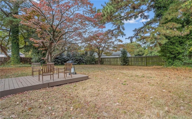 view of yard with a deck