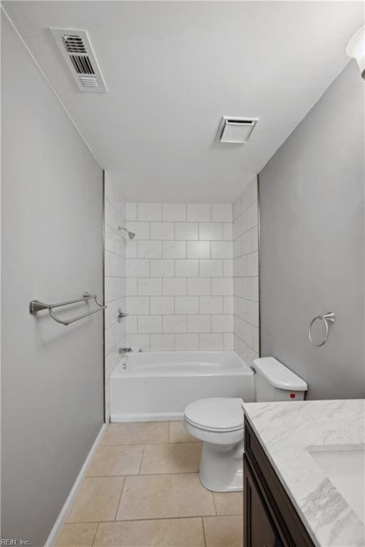 full bathroom with toilet, vanity, tile patterned floors, and tiled shower / bath