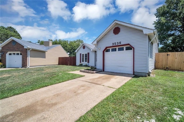 ranch-style house with a garage and a front lawn