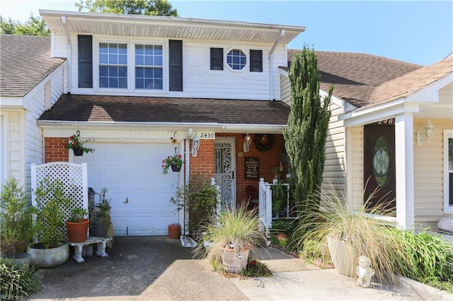 view of front of home with a garage