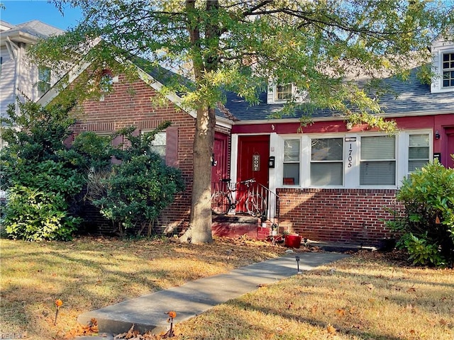 view of front of home with a front yard