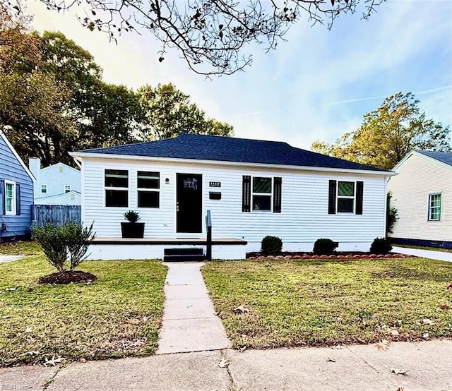 view of front of house with a front lawn