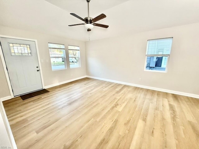 foyer featuring light hardwood / wood-style floors and ceiling fan