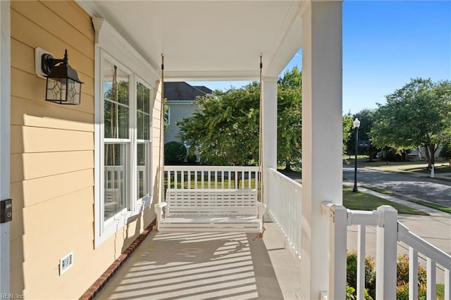 balcony featuring covered porch