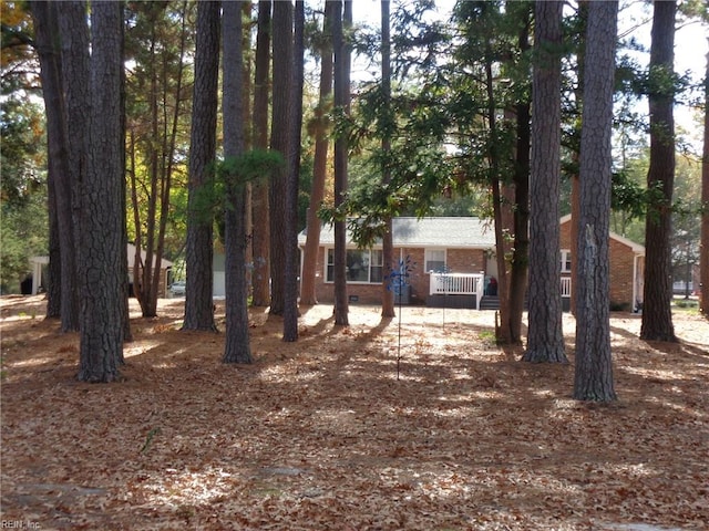 exterior space featuring a wooden deck