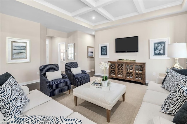 living room with light hardwood / wood-style flooring, coffered ceiling, and beam ceiling