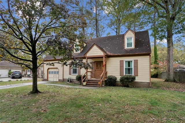 cape cod home with a front yard and a garage