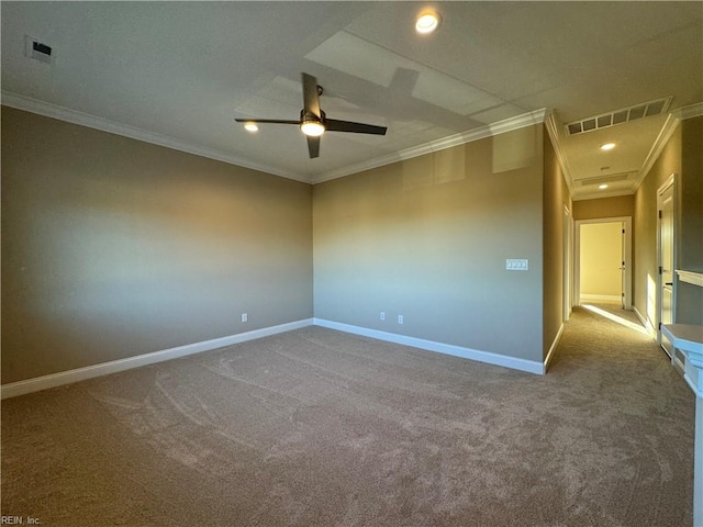 empty room featuring ornamental molding, carpet, and ceiling fan