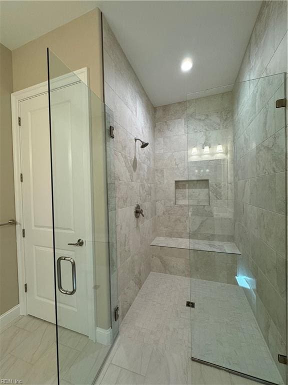 bathroom with an enclosed shower