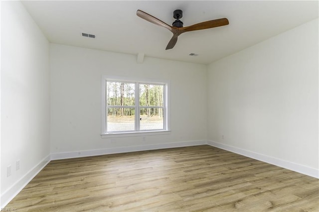 unfurnished room with light hardwood / wood-style floors and ceiling fan