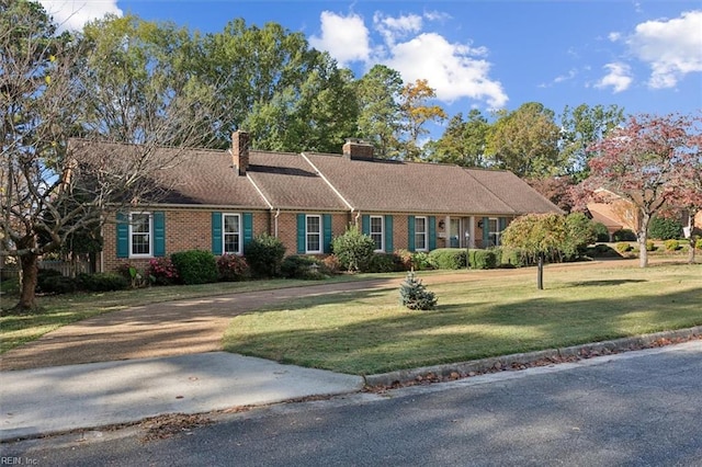 ranch-style home with a front yard