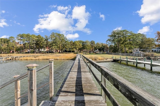 view of dock with a water view