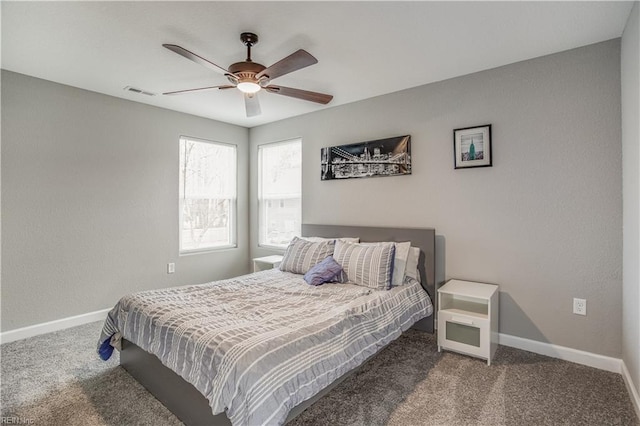 bedroom with ceiling fan and carpet flooring