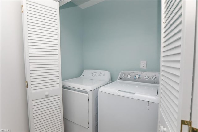 laundry room featuring independent washer and dryer