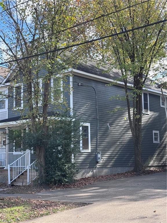 view of home's exterior with covered porch