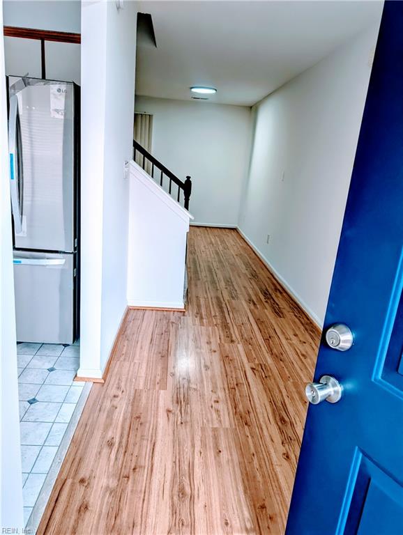 foyer entrance featuring light wood-type flooring