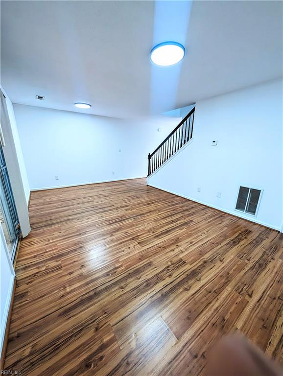 spare room featuring hardwood / wood-style flooring