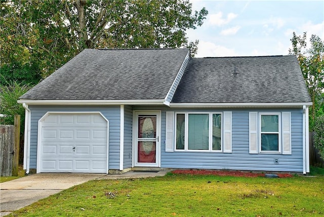 view of front facade with a front lawn and a garage