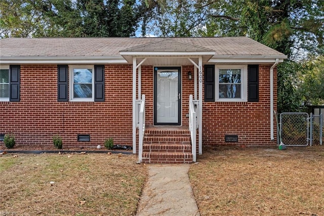 view of front of home with a front lawn