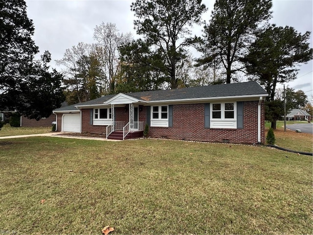 ranch-style home with a garage and a front yard