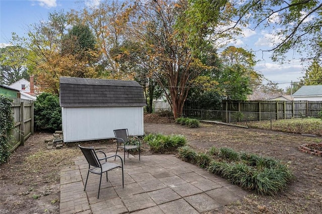 view of patio / terrace featuring a shed